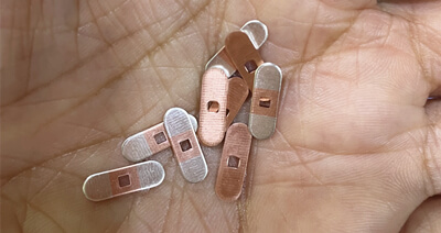 การจัดส่งแสตมป์ที่ทำจากแถบฝังเงิน